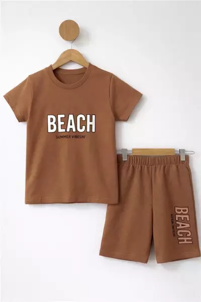 /resimler/cacheweb/urunler/2-9-yas-yazlik-erkek-cocuk-takim-beach-baskili-kahverengi1_176359.webp?v=639098876318992471