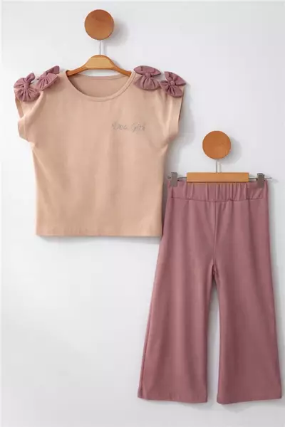 /resimler/cacheweb/urunler/deco-2-6-yas-kiz-cocuk-fiyonklu-yazlik-takim-gul-kurusu1_176199.webp?v=639095319459308481