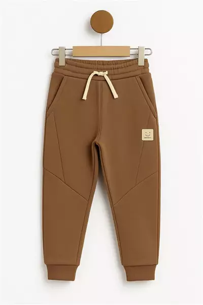 /resimler/cacheweb/urunler/nickel_1-4_yas_kislik_3_iplik_pantolon_parcali_kahverengi1_167323.webp?v=638994216847387772